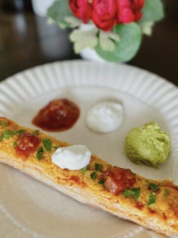 lazy enchiladas Chicken enchiladas with sour cream salsa and guacamole